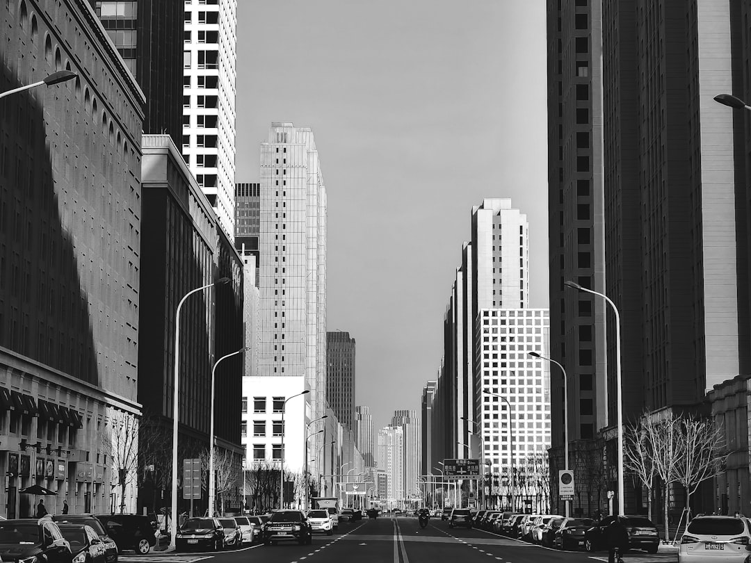 grayscale photo of city buildings